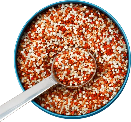 bioniq GO Swiss granules in a bowl with a measuring spoon